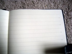 notebook-with-dots-on-lines