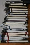 pile-of-notebooks-100x150