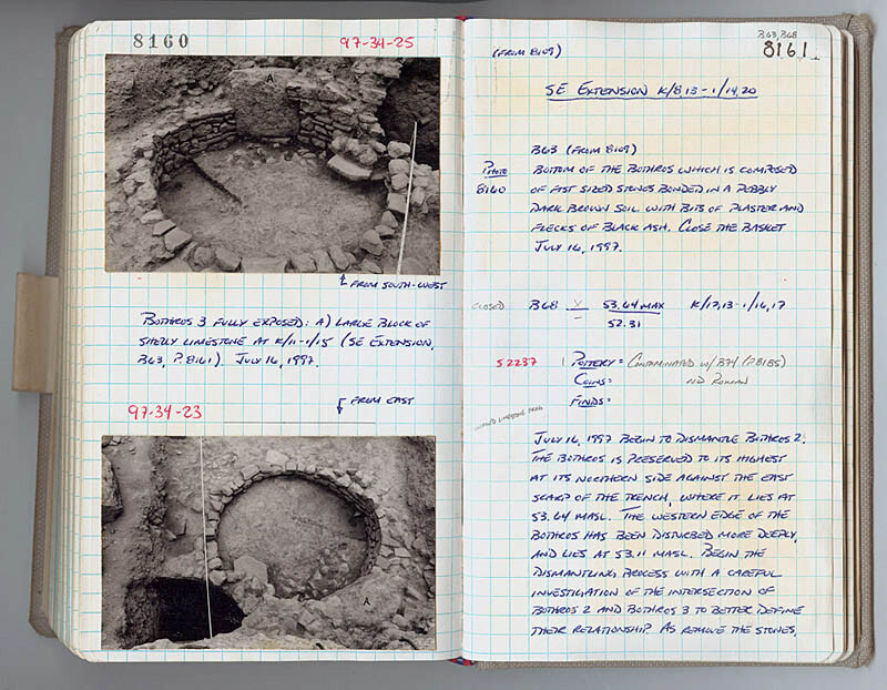 archaeological notebook with photos