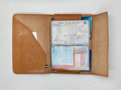 louise carmen notebook used as wallet