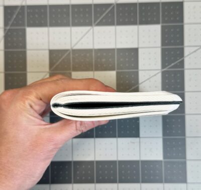 logical prime a6 slim grid notebook opens flat